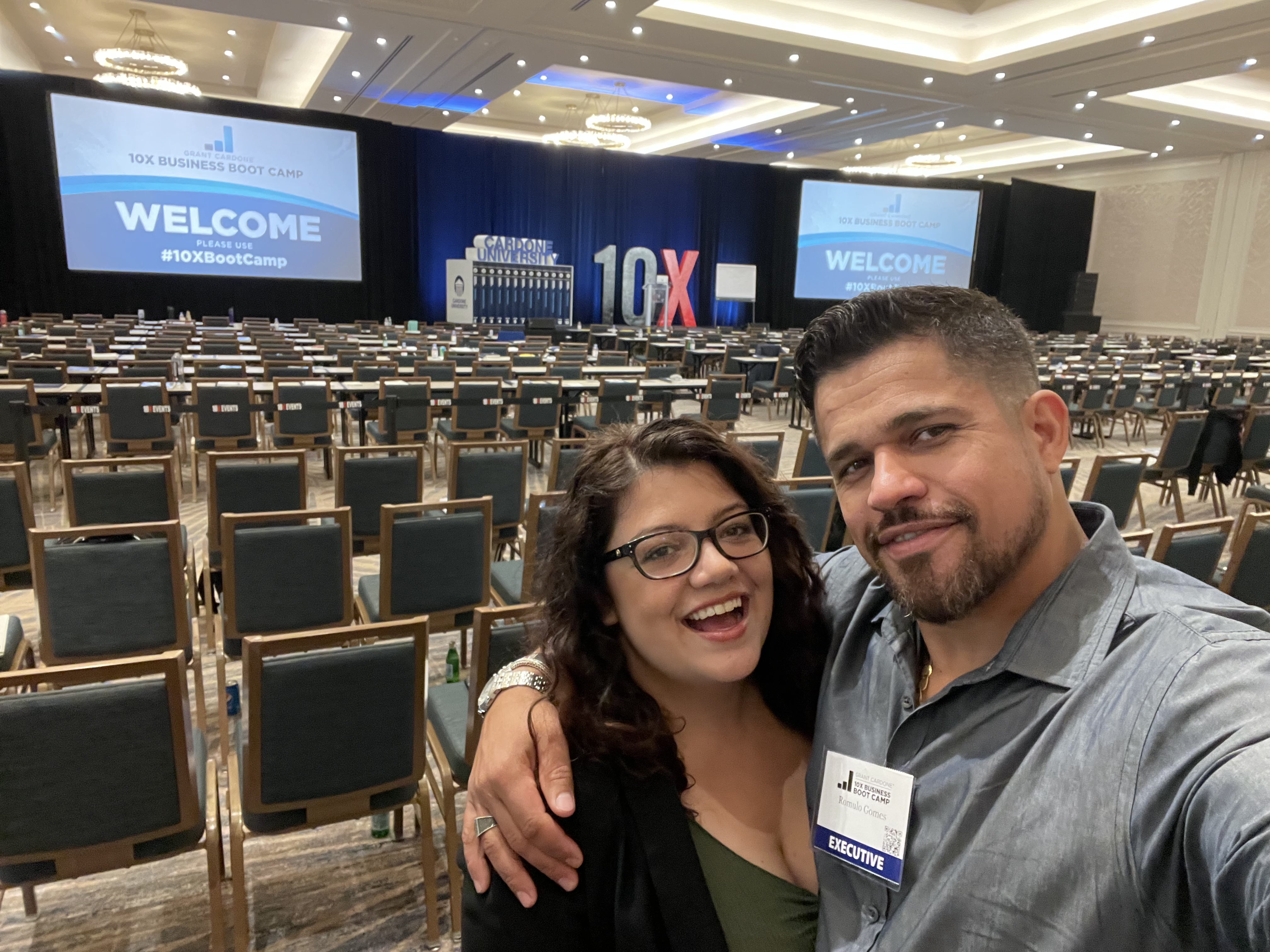 Romulo Caitano Gomes and his wife at a business leadership event