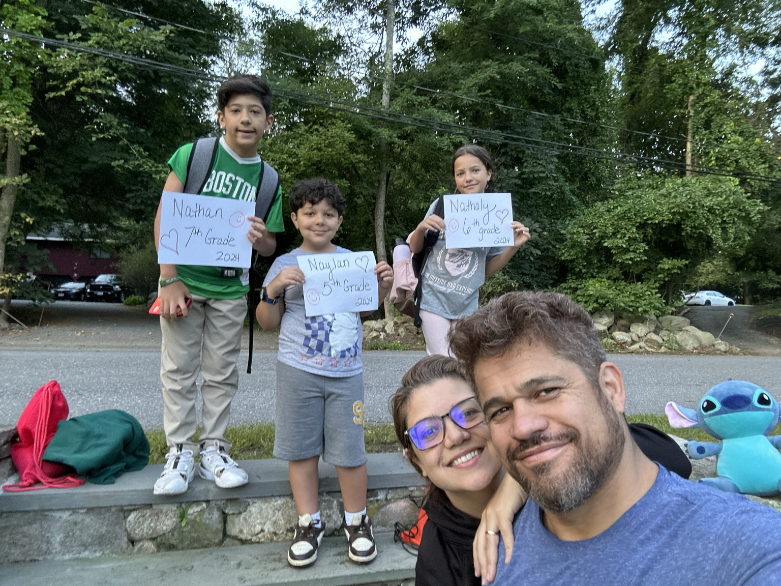 Romulo and Yssa with their three children on the first day of school